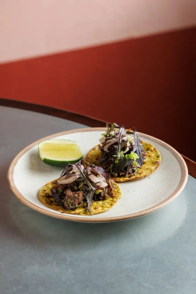 Keralan beef pepper fry tacos served at Tanvi, an Indian restaurant in St George’s Bay Malta, with thepla roti, red onion and fresh herbs