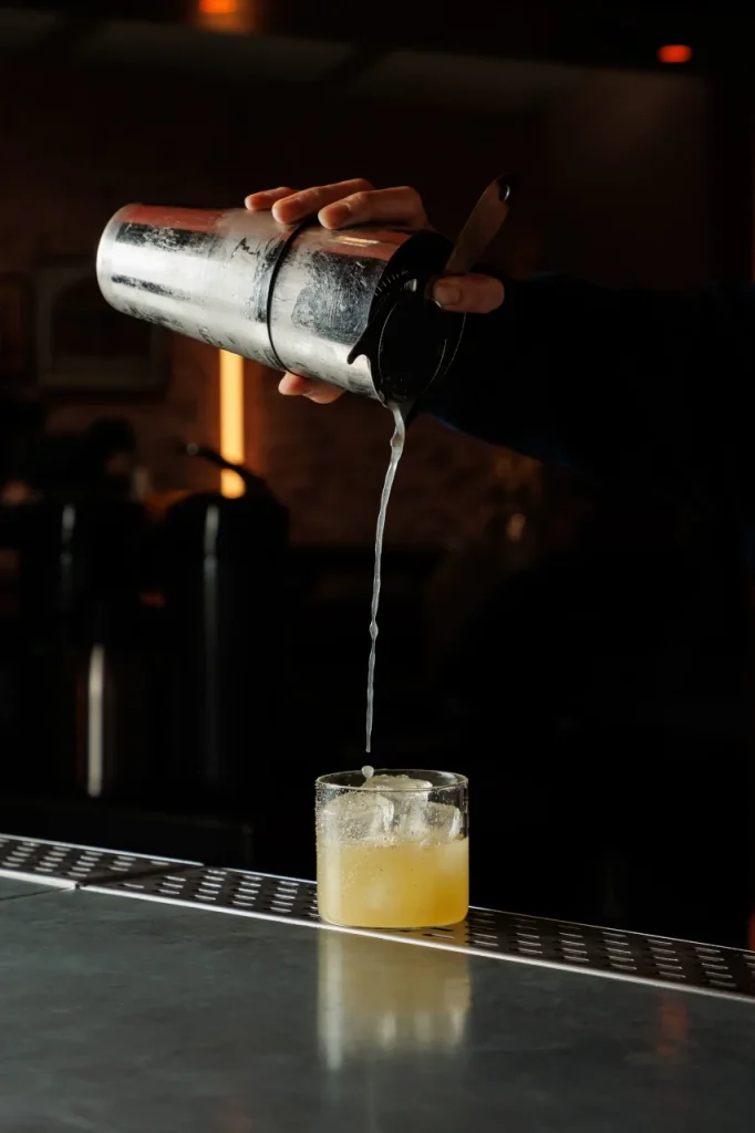 Signature cocktail being poured at Tanvi, an Indian restaurant and cocktail lounge in St George’s Bay Malta.